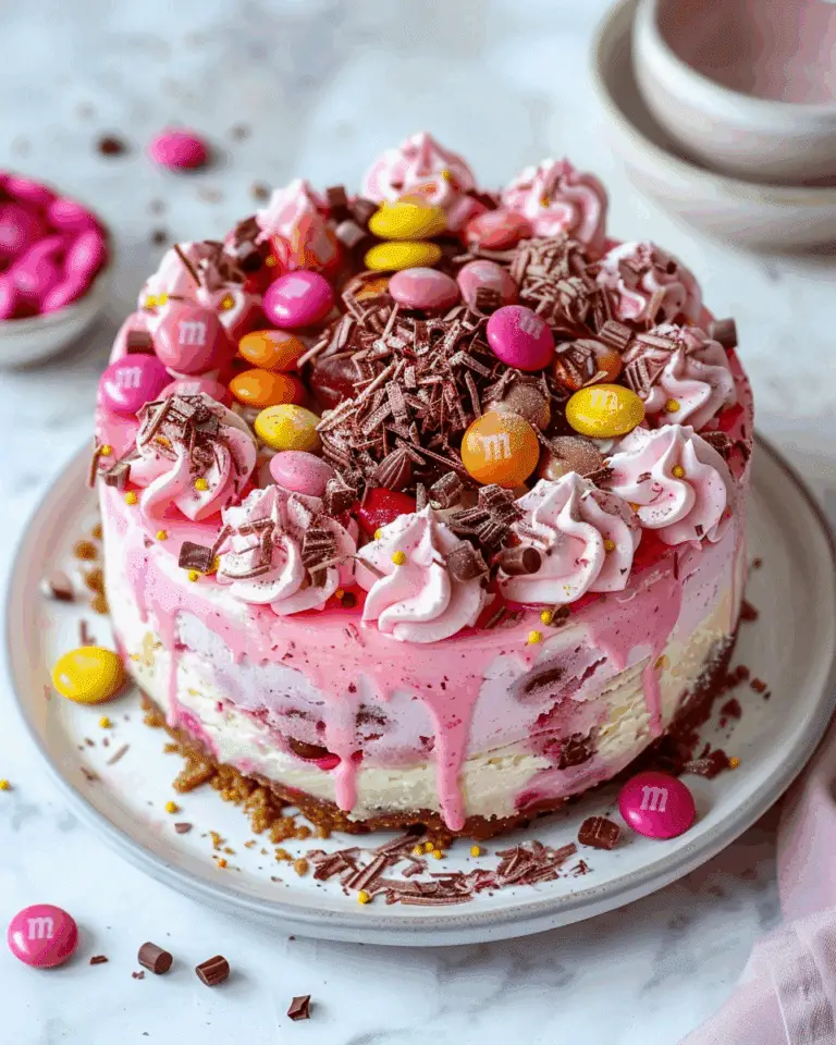 Pink M&M Snickers Cheesecake