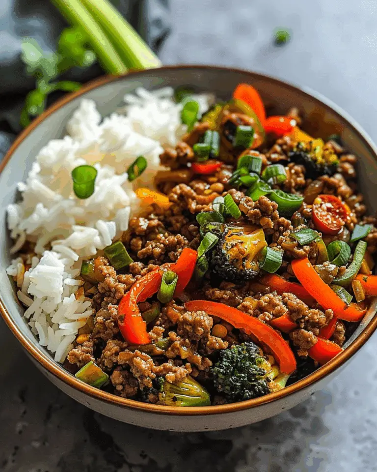 Spicy Ground Beef Stir-Fry Bowl with Garlic Veggies and Steamy Rice