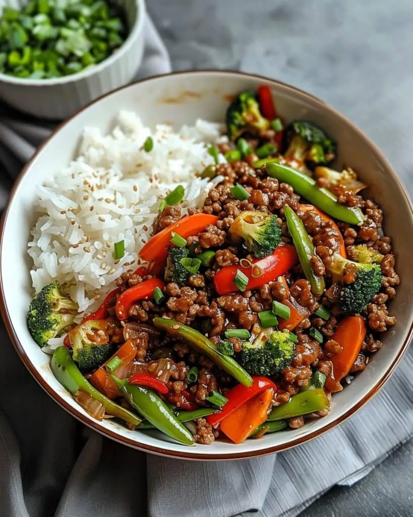 Spicy Ground Beef Stir-Fry Bowl with Garlic Veggies & Steamy Rice