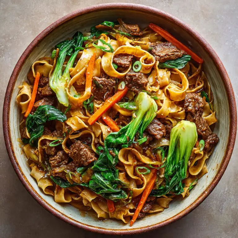 Spicy Cumin Beef Noodles with Carrots and Bok Choy