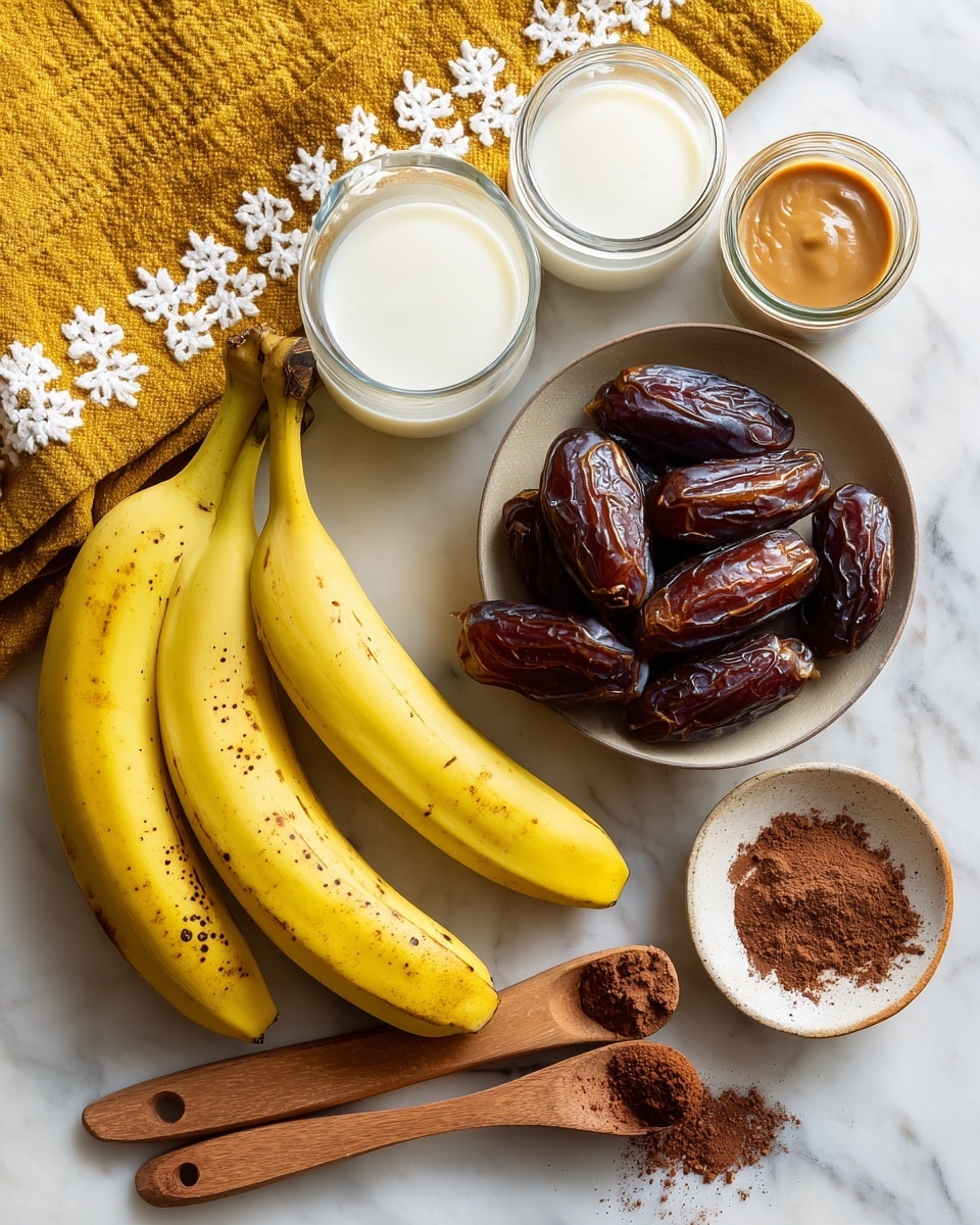 The image shows a bunch of three yellow bananas with small brown spots on a white marbled surface. Nearby, a round bowl holds dark brown dates with a shiny and wrinkled texture. Around these are various glass containers filled with white milk, light brown peanut butter, and dark liquid syrup. There are three wooden measuring spoons placed near the bananas, and a small amount of cocoa powder is spread on a white ceramic dish. A mustard yellow textured cloth with white embroidered details sits at the top. photo taken with an iphone --ar 4:5 --v 7